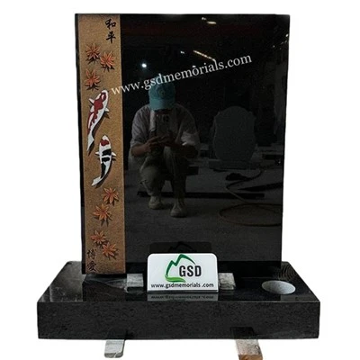 Black Headstone With Fish Etching